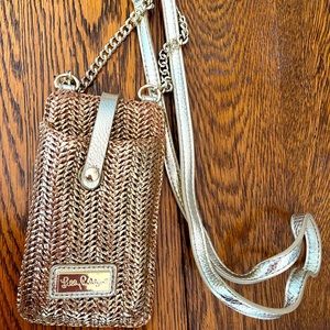 Gold Lilly Pulitzer smartphone case/ purse.